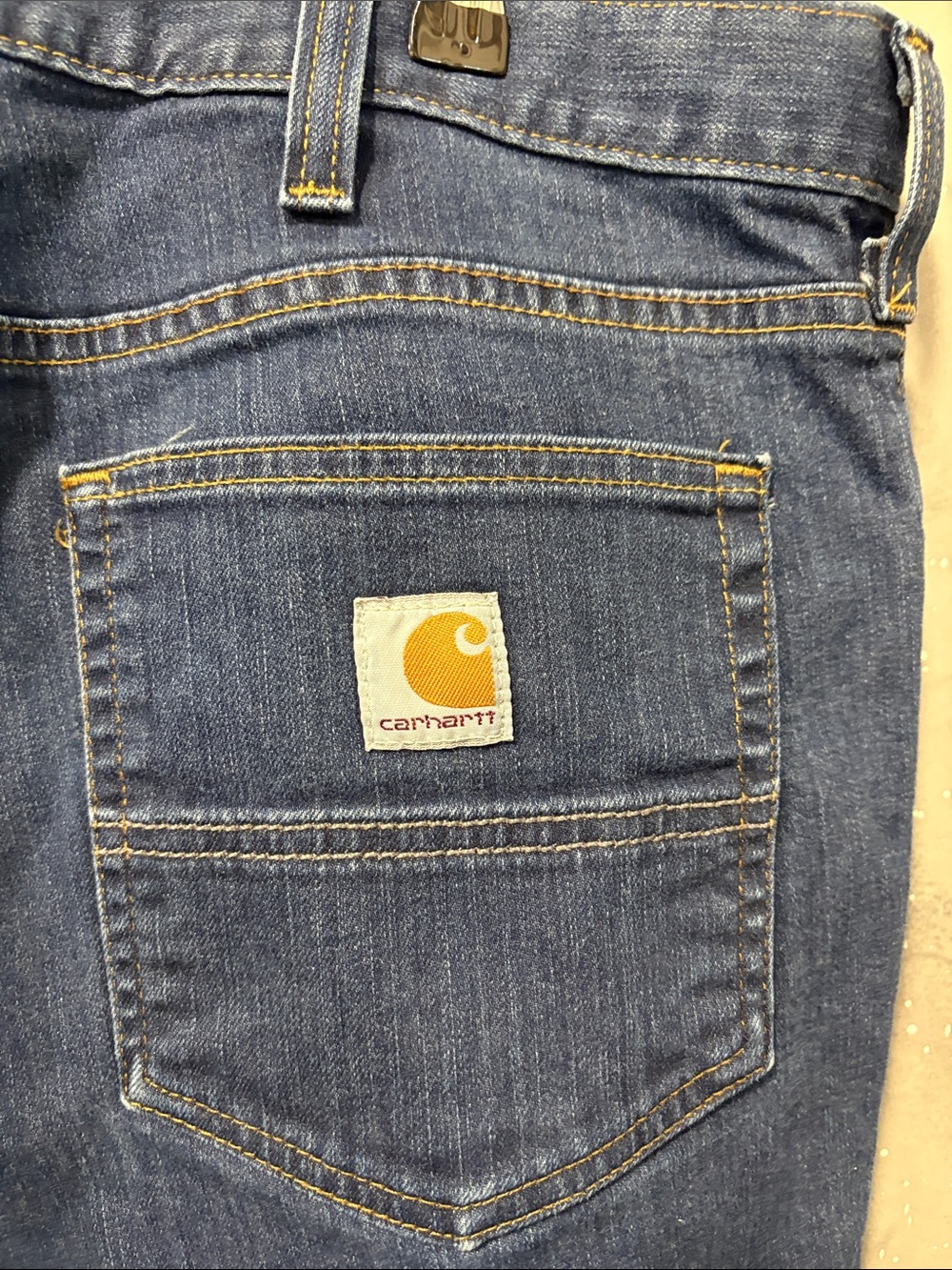 Carhartt Indigo Blue Denim Jeans with Back Logo Patch